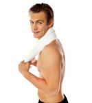 Man holding gym towel Stock Photo