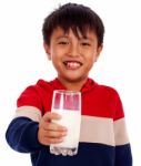 Boy Getting Calcium By Drinking Milk Stock Photo
