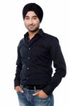 Young Isolated Indian Guy Posing Casually Stock Photo