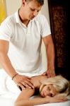 Young Caucasian Getting A Massage Stock Photo