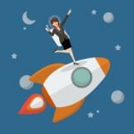 Business Woman Astronaut Standing On A Rocket Stock Photo