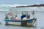 Bude, Cornwall/uk - August 15 : Boat And Surfers At Bude In Corn Stock Photo