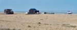 Old Shacks And Boats On Dungeness Beach Stock Photo
