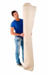 Man With Roll Of Carpet Stock Photo