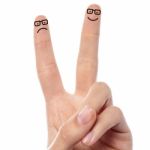 Couple Of Fingers With Sketched Smiley Stock Photo