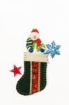 One Snow Man In The Green Christmas Sock Stock Photo