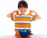 Young Little Boy Showing His Strength Stock Photo
