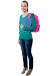 Young College Girl Posing With Backpack Stock Photo