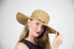 Mature Blonde Female In Large Hat Stock Photo