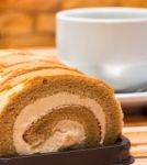 Swiss Roll Represents Coffee Shop And Barista Stock Photo