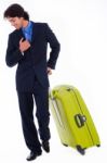 Corporate Man Looking Down With The Luggage Stock Photo