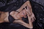 Woman Trapped In Black Fishnet Stock Photo