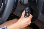 Women Driver Hand Inserting Car Key And Starting Engine Stock Photo
