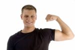 Man Showing Muscles Stock Photo