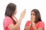 Mother Preparing To Slap Her Daughter In The Face Stock Photo