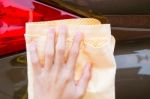 Close Up Of Yellow Chamois (microfiber Towel) On Car Stock Photo