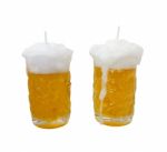 Yellow Beer Glass Candle Stock Photo