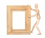 Wooden Figure Hold Blank Square Wooden Frame Stock Photo