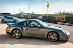 Side View Of Porsche Sports Car At Thruxton Racing Circuit Stock Photo