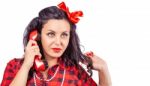 Portrait Of Brunette Woman In Red Dress With Phone In Pinup Stul Stock Photo