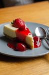 Strawberry Cheesecake With Spoon And Fork Stock Photo
