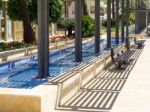 Marbella, Andalucia/spain - May 4 : Blue Pool At Avienda Del Mar Stock Photo