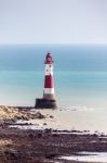 The Lighthouse At Beachey Head Stock Photo