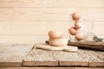 Egg, Chicken Egg In Wood Bowl On Old Wooden Table Stock Photo