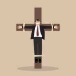 Crucified Business Man Stock Photo