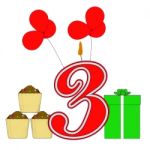 Number Three Candle Shows Birthday Presents And Cupcakes Stock Photo