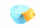 Blue Plastic Bucket And Right Yellow Cloth Clean On White Background Stock Photo