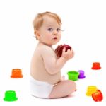 Cute Infant Boy With Apple Stock Photo