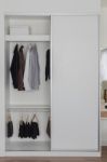 White Closet With Clothes And Accessories Stock Photo