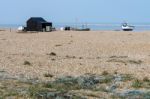 Old Shack And Boats On Dungeness Beach Stock Photo