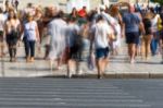 Blurry People Walking In The Street Stock Photo