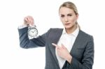 Boss Pointing At Alarm Clock, You Are Late! Stock Photo