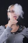 Woman Smoking E-cigarettete Stock Photo