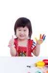 Adorable Little Asian (thai) Girl Painting Her Palm, Isolated On Stock Photo