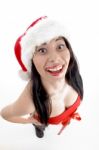 Young Girl Wearing Christmas Hat Stock Photo