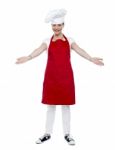 Smiling Aged Lady Chef Gesturing Stock Photo