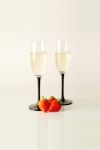 Champagne Flutes With Strawberries Stock Photo