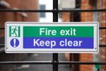 Fire Exit Sign Stock Photo