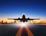 Cargo Plane Take Off From Airport Runways Against Ship Port Background Use For Air Transportation And Cargo Logistic Industry ,import ,export Business Stock Photo