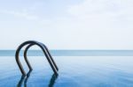 Sea View Of Infinity Swimming Pool With Sky Stock Photo