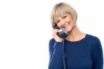 Beautiful Lady Holding Phone Receiver Stock Photo