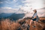 Hiker On Color Sienna Blue Two Tone Stock Photo