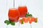 Fresh Tropical Papaya Juice Isolated On A White Background Stock Photo