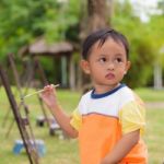 Little Boy Painting Stock Photo