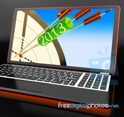 2013 Arrows On Laptop Shows Aimed Plans Stock Image