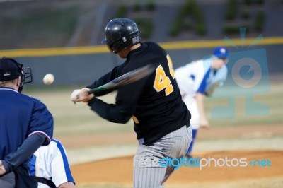 A Batter About To Hit A Pitch During A Baseball Game Stock Photo